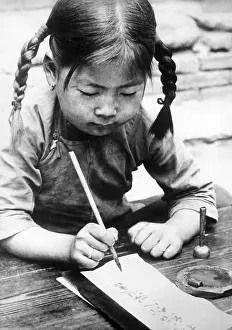 Brushes: Chinese girl writing, 1940