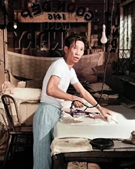 Cpc001: Chinese Laundry Man Looking at Camera Working