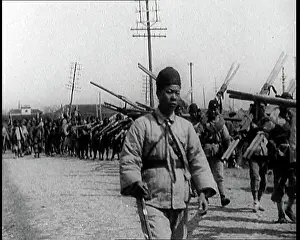 Chinese Soldiers Marching Carrying Flags and