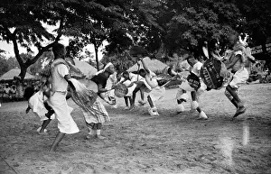 Chopi: Chopi Timbila dancers in performance, just before slapping
