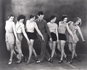 Coordinate: Choreographer rehearsing with dancers