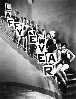 Thespians: A chorus line standing on a curved stair case