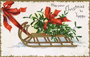 Clapsaddle: Christmas Mistletoe being pulled along atop a wooden frame