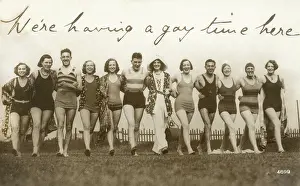 Chums: Twelve Chums having a gay old time on the beach