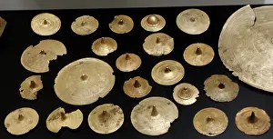 Ornamental: Circular bronze belt ornaments. Bronze Age. 1400 BC. Found a