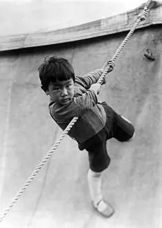Fixing: Circus child in China, 1932