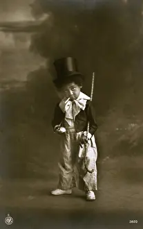 Canes: A circus child smoking a cigarette
