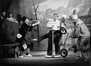 Hatted: Circus clowns performing