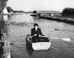 Maurice Ambler Collection: City gent boating to work