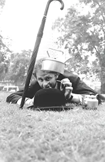 Hatted: City gent in a park