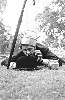Hatted: City gent in a park
