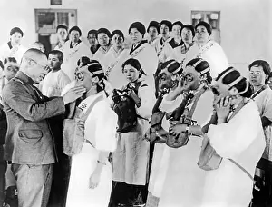 Helps: Civil air-raid exercise in Japan, 1930s