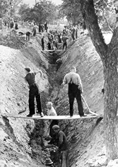 Construct: Civilians building fortifications, 1944