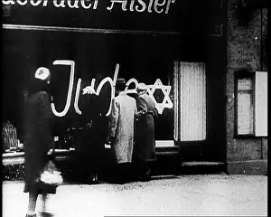 Juden: Civilians Looking at Shop Window with Graffiti