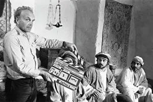 Clapperboard: Clapperboard in front of actors in biblical costume