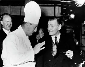 Heyday: Clark Gable, American actor, chats with a chef