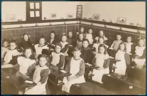 Pinafores: Classroom of girls