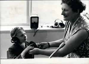 Impaired: Classroom scene with teacher and pupil