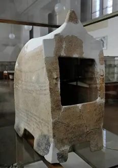 Rockefeller: Clay ossuary. Haderah. In form of a house, used for secondar