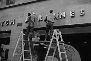 Fascia: Cleaners at work in Central London