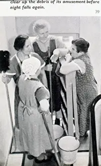 Cleaner: Four cleaning ladies having a rest and a chat