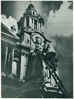 May23: Cleaning statue of Queen Anne