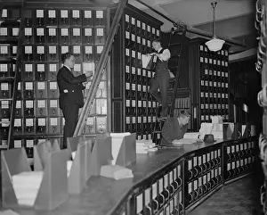 Analog: Clerks working in Capitol Document Room where