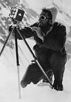 Himalayas: Climber with film camera