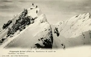Gallen: Climbers at the peak of a mountain in the Churfirsten range