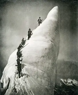 Pinnacle: Climbing a serac, glacier pinnacle, in the Alps