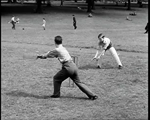 Pads: A Close Up of Boys Playing Cricket With A Batsman