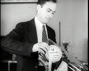 Labelled: Close Up of a British Man Inserting A Pathe