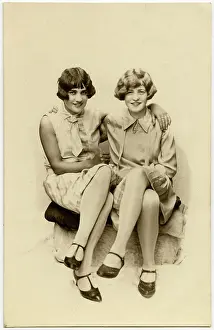 Waved: Two close lady friends in stylish attire