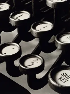 No One: Close up photograph of keys of a manual typewriter