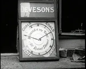 Coals: Close Up Shot of a Damaged Clock Advertising