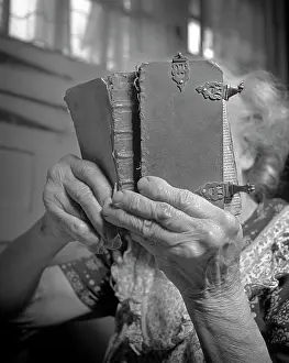 Literate: Close-Up of Elderly Woman with Arthritic Hands