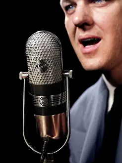 Anchorman: Close-Up of Man Announcer Talking Into Microphone