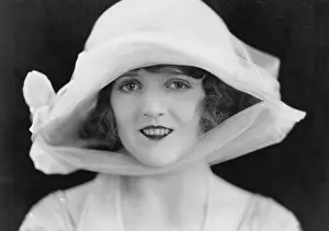 Classy: Close-up of smiling woman in hat