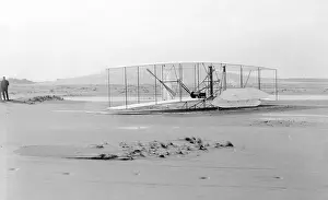 Rudder: Close-up view of damaged 1903 machine, rudder frame broken i