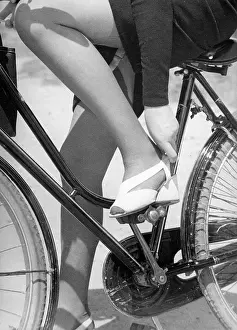 Objectitaly: Close-up of a woman on a bicycle