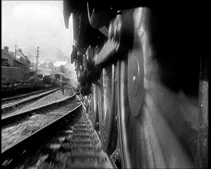 Quickly: Close View Of Steam Train Wheels Spinning Quickly