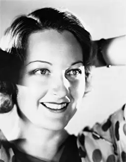 Contented: Closeup of smiling woman