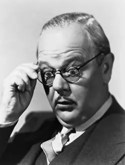 Astonishment: Closeup of surprised man with glasses