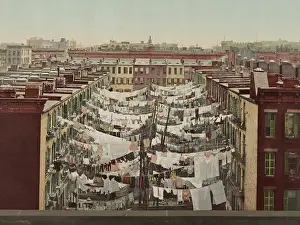 Tenements: Clothes drying on lines between New York City
