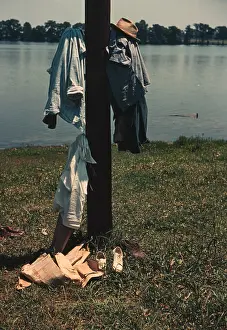 Neighborhoods: Clothes of swimmers hanging on a telegraph pole, Lake Provid