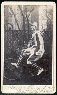 Absurd: Clown on Bicycle Photo