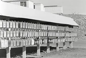 Inexpensive: Cluster of mail boxes at a mobile home park in