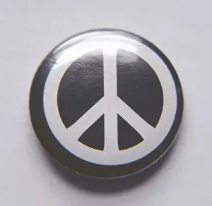 Incorporates: CND badge, UK