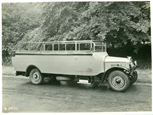 Wadham: Coach on A2 long, Wadham. Open-top single-decker bus