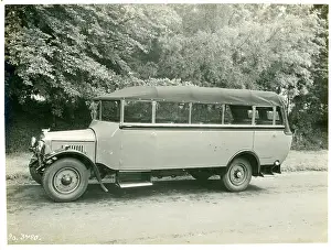 Wadham: Coach on A2 long, Wadham. Open-top single-decker bus